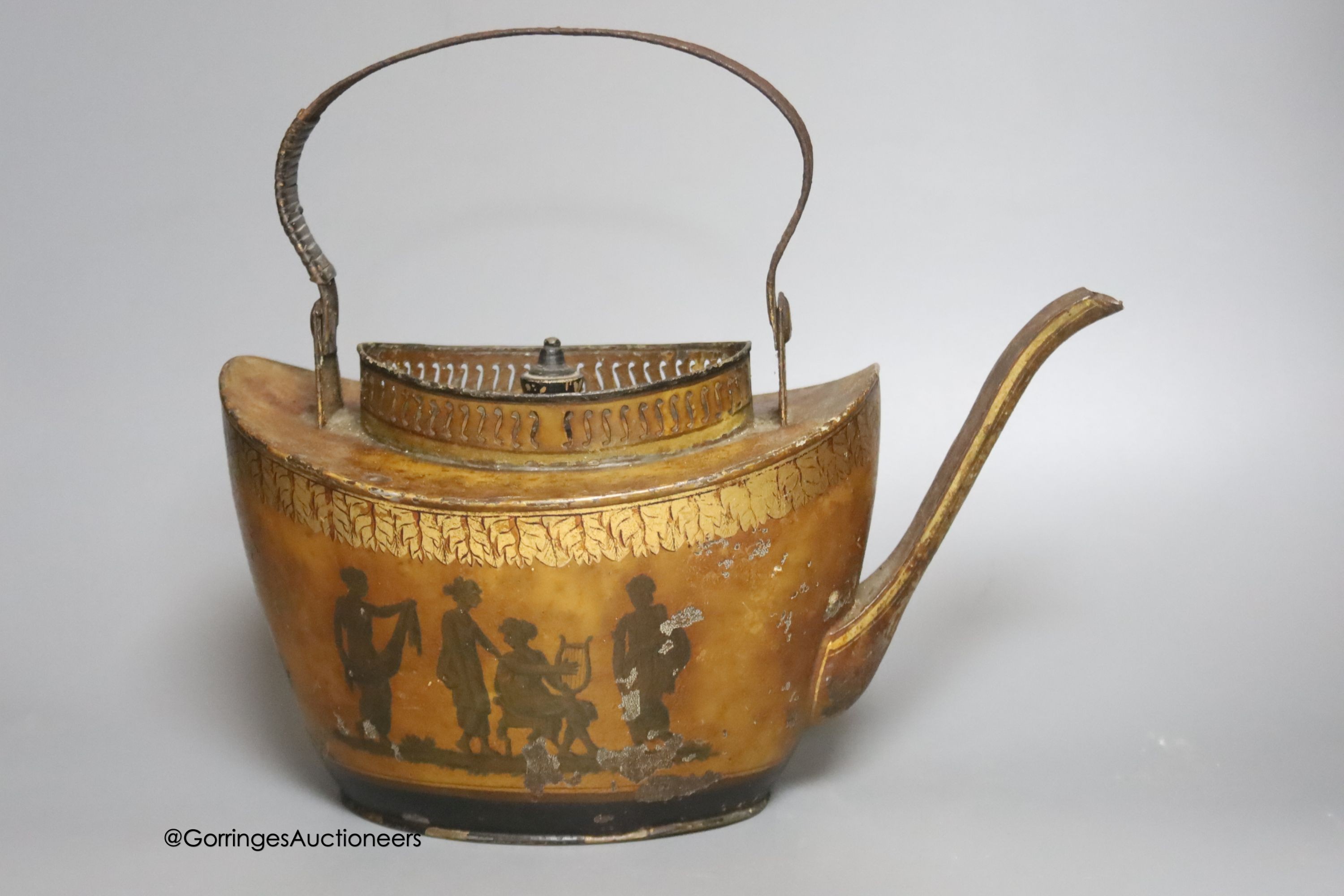 A 19th century Pontypool toleware tea kettle, length 31cm